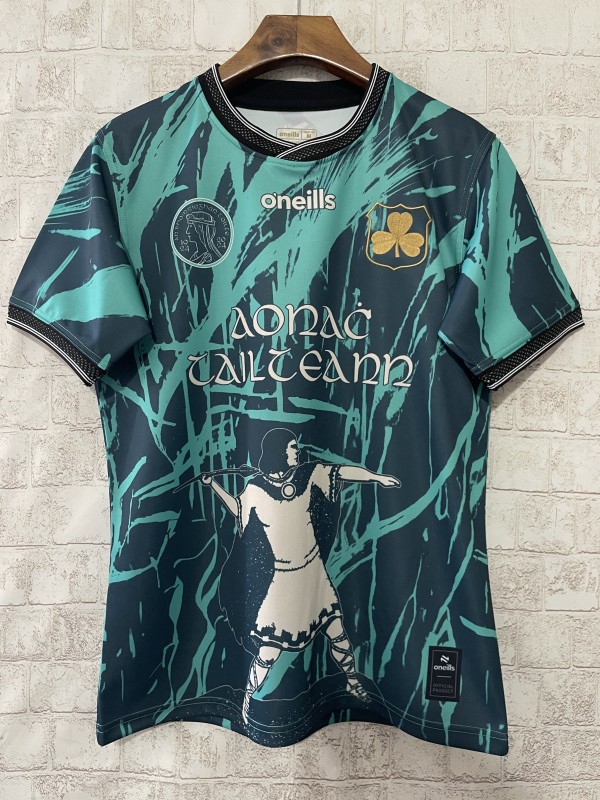 25/26 Tipperary GAA Teal with Warrior Silhouette and Abstract Brushstroke Pattern Jersey